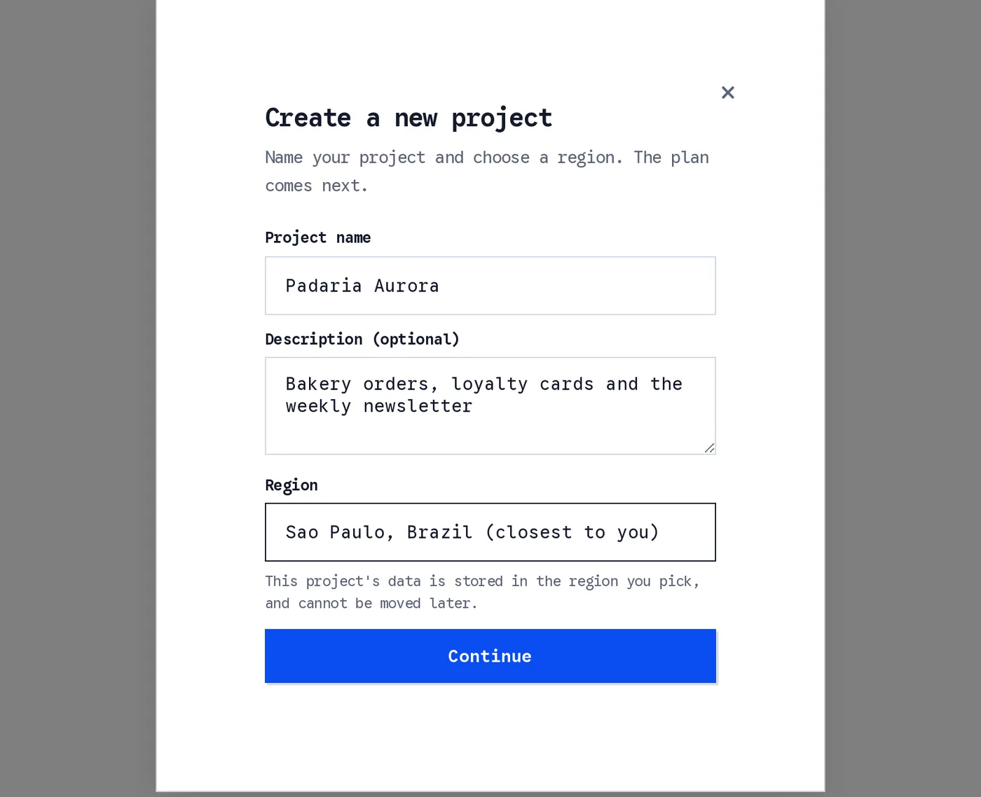 The Create a new project dialog: a project name, an optional description, and a Region field reading Sao Paulo, Brazil (closest to you), with a note that the project's data is stored in the region you pick and cannot be moved later